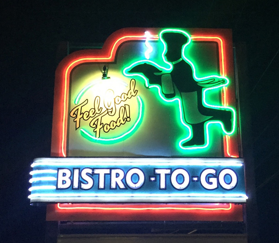 bistro-to-go-sign-at-night